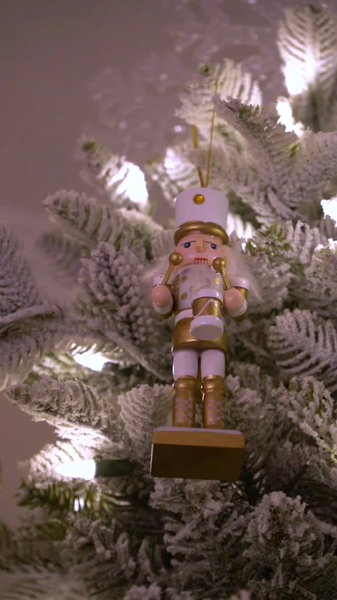 Christmas ornaments on pine tree captured with warm lighting and festive Stock Footage 327317971