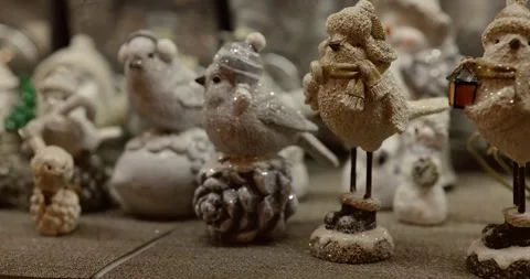 Christmas ornaments shaped like tiny winter birds at the Christmas market. Stock Footage 256937100