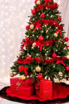 Christmas packages under the tree Stock Photos