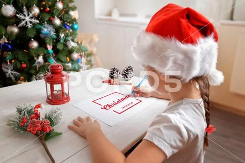 Christmas paper mockup with child drawing near tree PSD Template