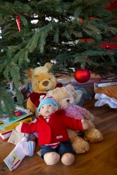 Christmas party tree present stuffed animal game Stock Photos