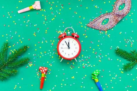 Christmas pattern flat lay with red alarm clock Stock Photos