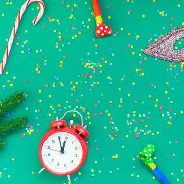 Christmas pattern flat lay with red alarm clock Stock Photos