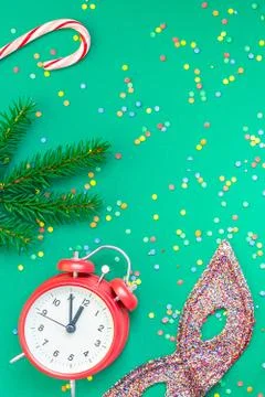 Christmas pattern flat lay with red alarm clock Stock Photos