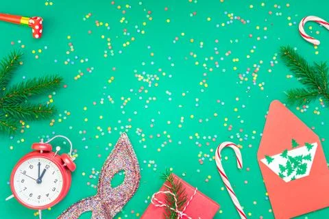 Christmas pattern flat lay with red alarm clock Stock Photos