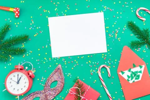 Christmas pattern flat lay with red alarm clock Stock Photos