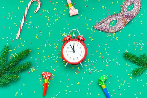Christmas pattern flat lay with red alarm clock Stock Photos