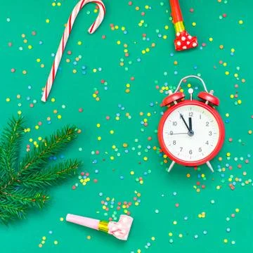 Christmas pattern flat lay with red alarm clock Stock Photos