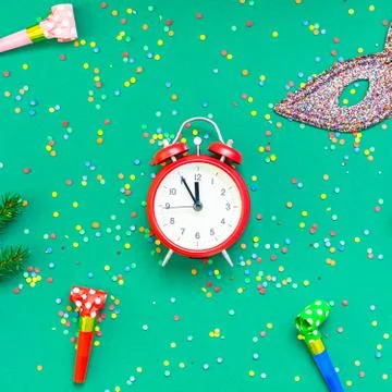 Christmas pattern flat lay with red alarm clock Stock Photos