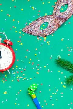 Christmas pattern flat lay with red alarm clock Stock Photos