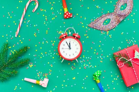 Christmas pattern flat lay with red alarm clock Stock Photos