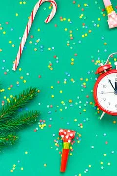 Christmas pattern flat lay with red alarm clock Stock Photos
