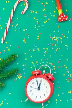 Christmas pattern flat lay with red alarm clock Stock Photos