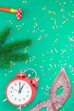 Christmas pattern flat lay with red alarm clock Stock Photos
