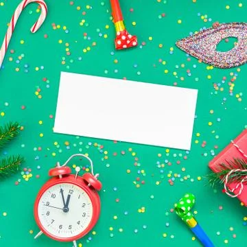 Christmas pattern flat lay with red alarm clock Stock Photos