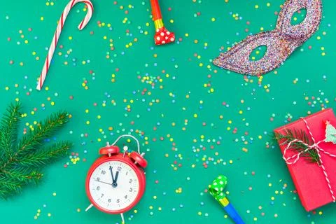 Christmas pattern flat lay with red alarm clock Stock Photos