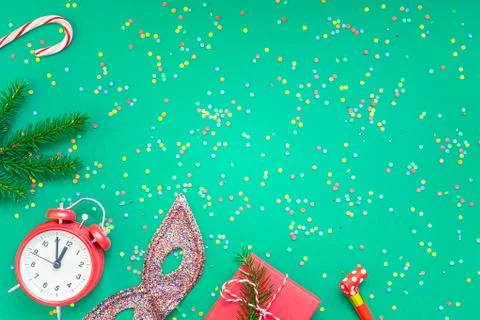 Christmas pattern flat lay with red alarm clock Stock Photos