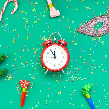 Christmas pattern flat lay with red alarm clock Stock Photos