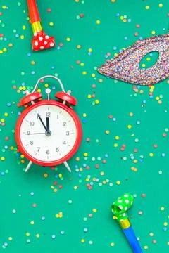 Christmas pattern flat lay with red alarm clock Stock Photos