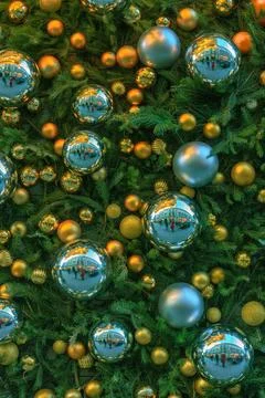 Christmas pattern with green branches pine, golden and silver shine baubles Stock Photos