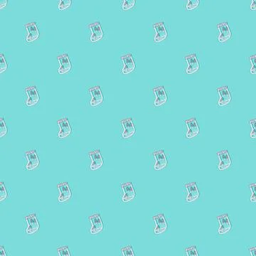 Christmas pattern from a sock on a blue background. Festive New Year concept. Stock Photos