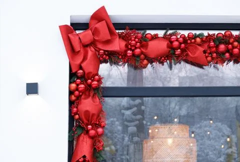 Christmas pattern wall window frame white background and red ribbon empty adv Stock Photos