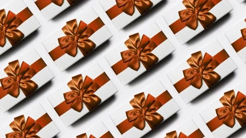 Christmas pattern of white gift boxes with bow, isolated on white background. 스톡 동영상 142496373