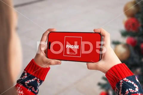Christmas phone mockup in horizontal view PSD Template