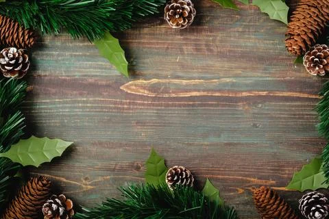 Christmas pine tree fir with pine cone decoration on vintage rustic wood ta.. Stock Photos