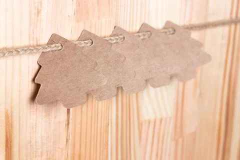 Christmas pine tree present labels on a twine. Stock Photos