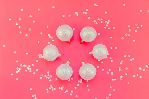 Christmas pink flat lay pattern with pearl balls Stock Photos