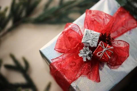 Christmas present box packed with red tape homemade present Stock Photos