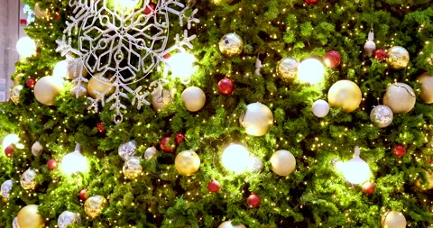 Christmas present gift box under bauble christmas tree decorated holiday Stock Footage 292048968