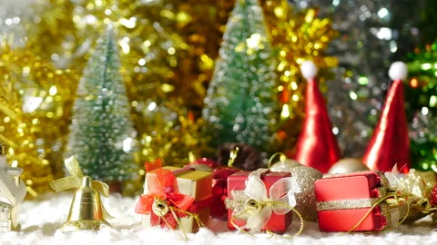 Christmas present gift box under bauble christmas tree decorated holiday Stock Footage 292053825