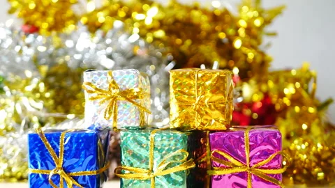 Christmas present gift box under bauble christmas tree decorated holiday Stock Footage 292053833