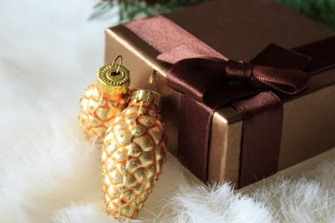 Christmas present on a light background. Close-up. Stock Photos