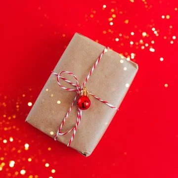 Christmas present on red background Stock Photos