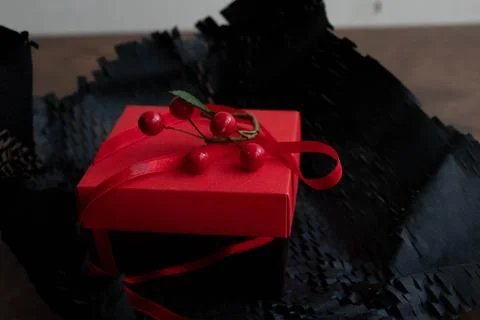 A Christmas Present on Red Background Stock Photos