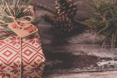 Christmas present with rustic decor and copyspace Stock Photos