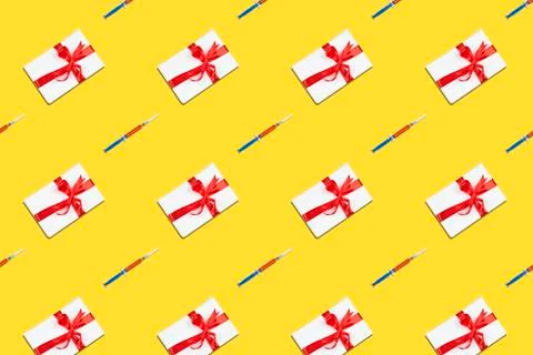 Christmas present on yellow Stock Photos
