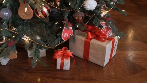 Christmas presents are under the tree Видео 70791418