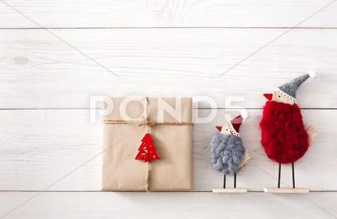 Christmas presents background on white wood Stock Photos