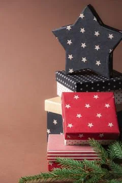 Christmas presents frame with a stack of red and black boxes with various Stockfoto's