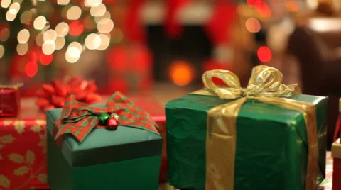 Christmas presents in front of tree, dolly movement Stock Footage