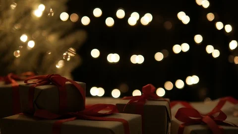 Christmas presents with lights background dolly shot Stock Footage 94486832