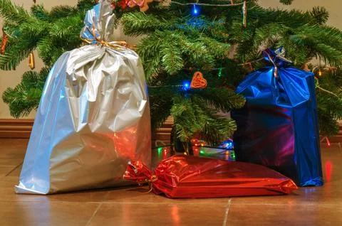 Christmas presents under the tree Stock Photos
