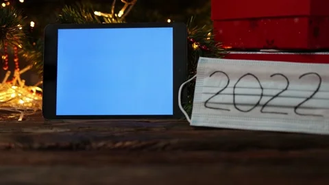 Christmas red gift box tablet gadget blue screen medicine protective mask 2022 Video stock 164486005