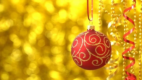 Christmas red with golden pattern ball spinning. New Year decoration. Blurred Stock Footage 69755657