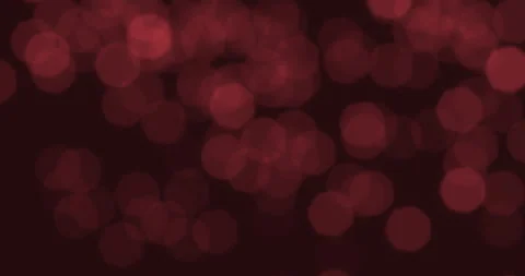 Christmas red sparkle glitter explosion dust particles background with bokeh Stockbeeldmateriaal 327657149