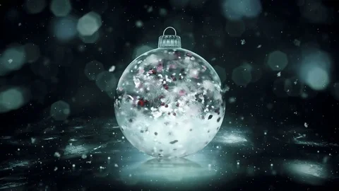 Christmas Rotating Grey Noir Ice Bauble snow colorful petals background loop Stock Footage 82431652